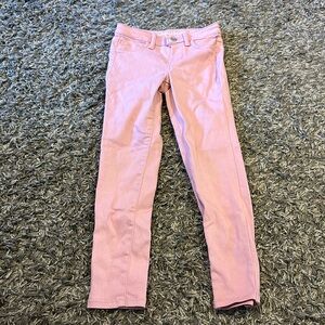 Pink stretchy skinny jeans.